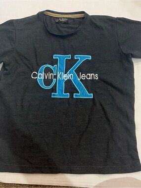Calvin Klein Jeans Black Tee with Yellow and Blue Collar Accents
